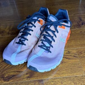 On Running Peach and Black Athletic Shoes